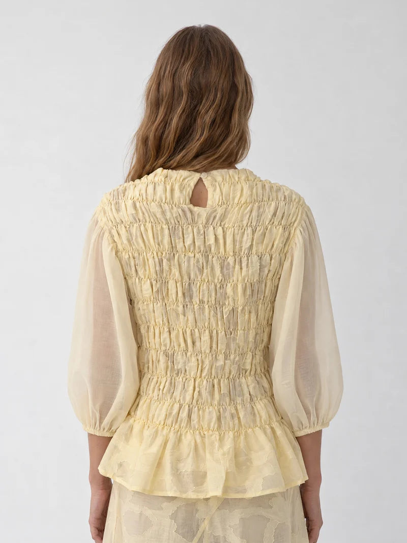 BUTTER AUTOMNE SMOCKED PEPLUM BLOUSE